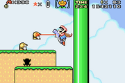 Super Mario World: Super Mario Advance 2 screenshot of Blue Yoshi eating a Monty Mole