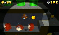 Tanooki Mario jumping across multiple Morty Moles
